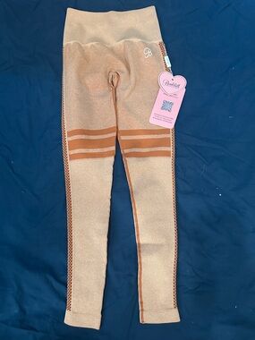 Bombshell Sportswear Peach Shimmer Leggings Size XS/S NWT